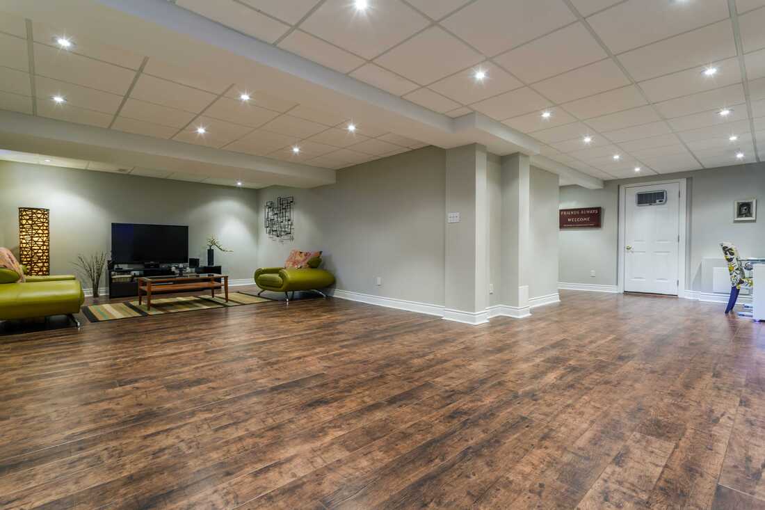 With rental prices increasing in Coquitlam, our client wanted to have their basement remodeling done as soon as possible and it turned out great. Our basement contractors installed hardwood flooring and added a kitchen, bathroom, and bedroom to the basement. 