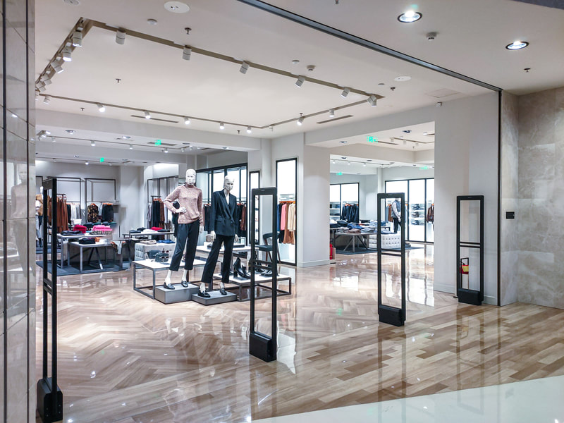 We performed a retail renovation for this high end clothing store in Coquitlam. Our commercial contractors installed wooden flooring with a glossy finish to give a luxury look.